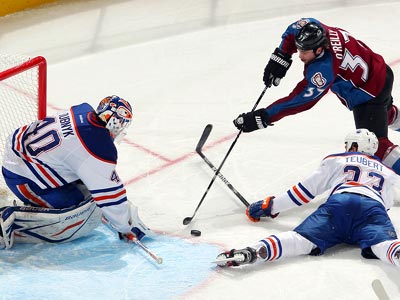 Oilers give one away and lose Hall to injury