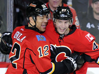 Flames win OT thriller against Sharks to keep pace in wicked west
