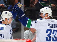 Canucks battle back for a 3-2 OT win in Colorado