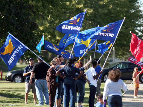 SNAPSHOT - Teachers protest in front of Dwight Duncan