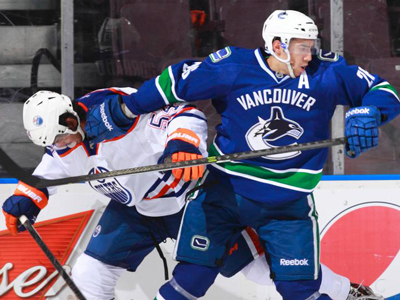 Canucks score five straight, hand Oilers third consecutive loss