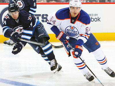 Eakins drops coaching debut, as Jets down Oilers