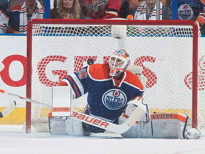 Oilers, Scrivens come up short in opening night loss to Flames