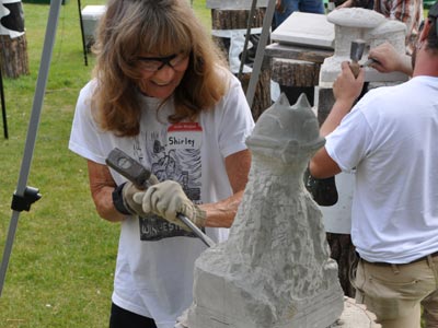 Milk & Mallets stone carving festival happening during Dairyfest